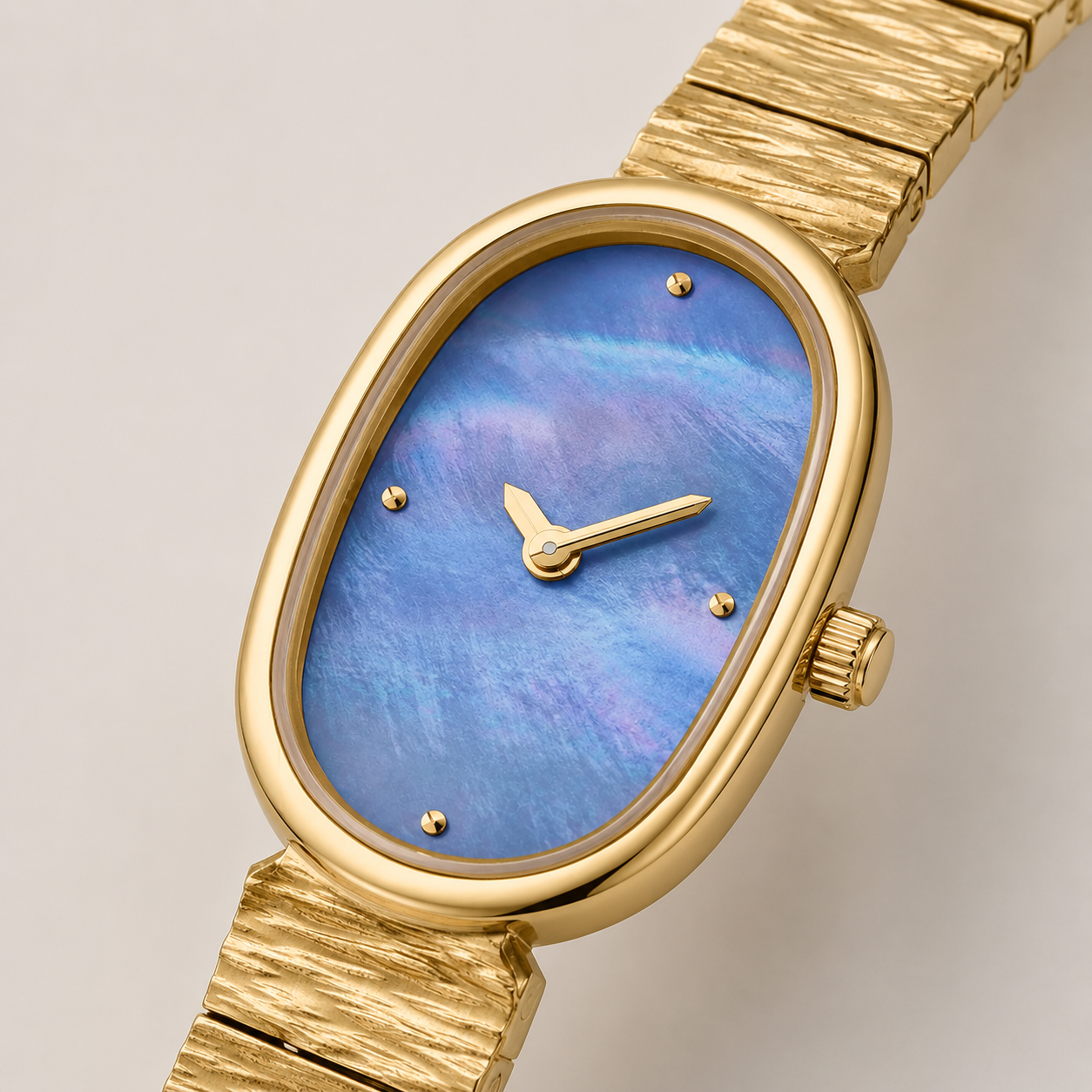 18mm Oval Quartz Watch with Cool Pearl-Effect Dial and Warm-Tone Bracelet